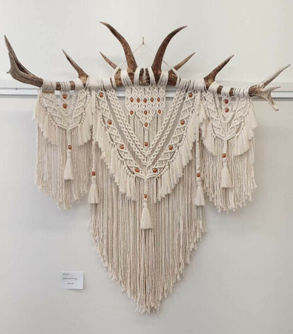 Macrame wall art on antlers