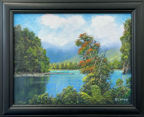 The product, "Rata Tree Buller Gorge," features a framed painting of a serene lake surrounded by lush greenery, with some trees displaying red leaves, and mountains in the background beneath a blue sky with clouds.